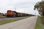8585 heads away as the train slows for a stop at Graham
